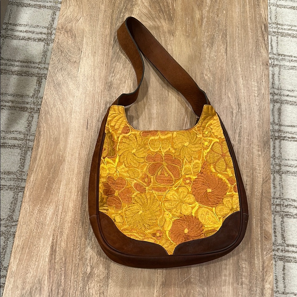 Handmade leather purse with yellow embroidery